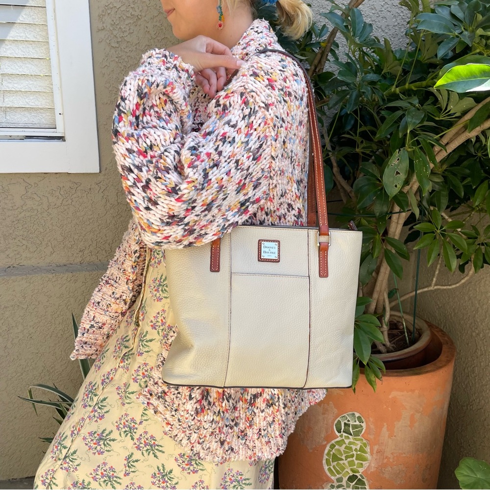 Cream/orange brown Dooney & Bourke pebbled leather bag